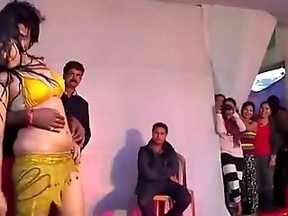 scorching indian female dancing on stage